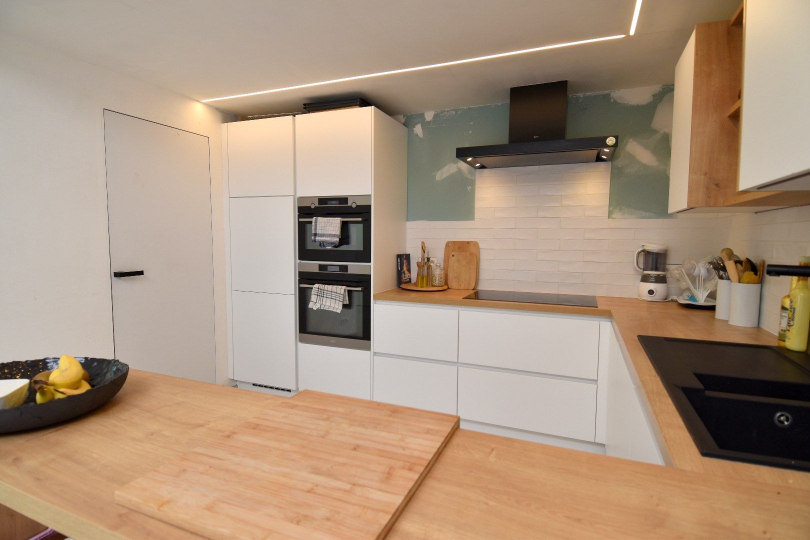 Hippe instapklare rijwoning met 3 slaapkamers en zonnige tuin te koop in Aalbeke foto 8
