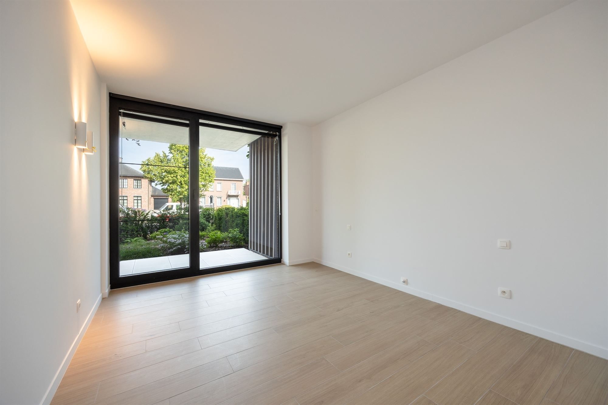 Lichtrijk en luxueus appartement met omvattende tuin foto 25