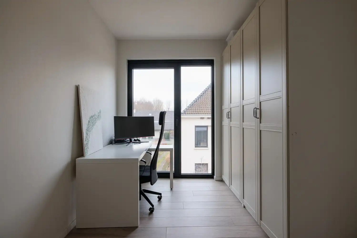 Recent en lichtrijk 2-slaapkamerappartement met garage foto 21