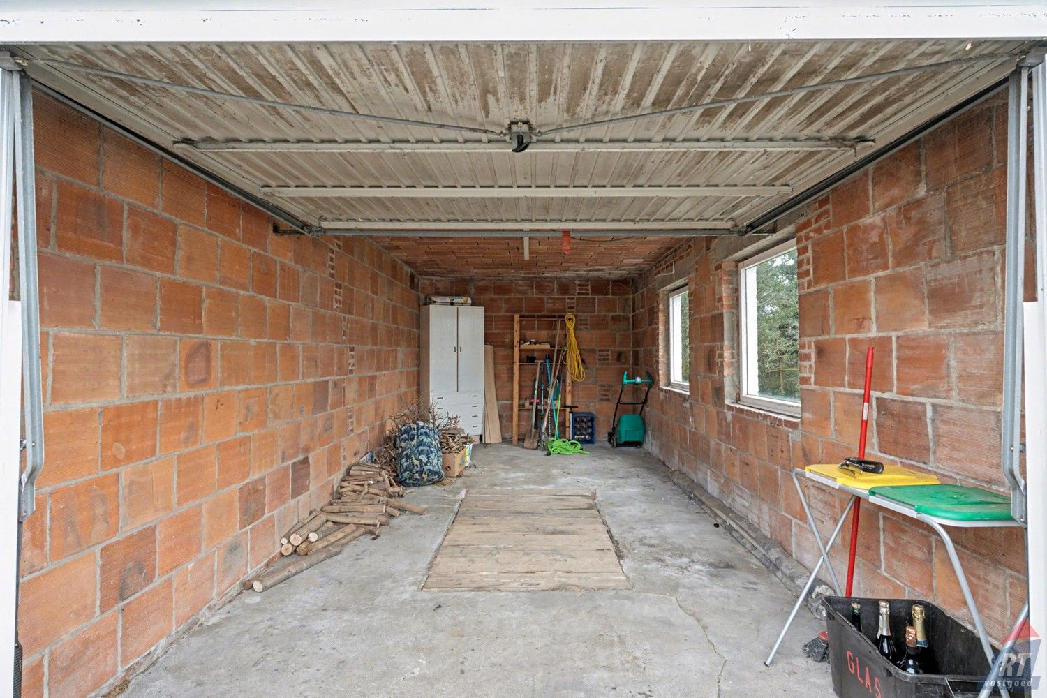 Gelijkvloerse halfopen woning met tuin en renovatiepotentieel in het hart van Sint-Truiden foto 15