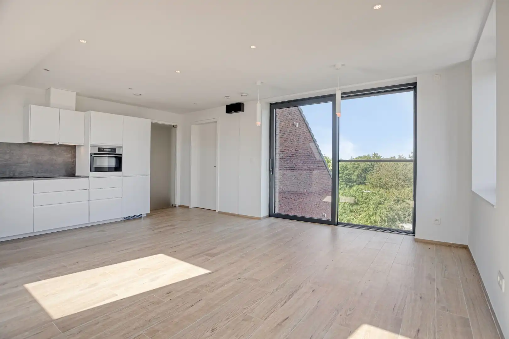 Gerenoveerd ruim en lichtrijk appartement met 2 slaapkamers - EPC  72Kwh/m² foto 10