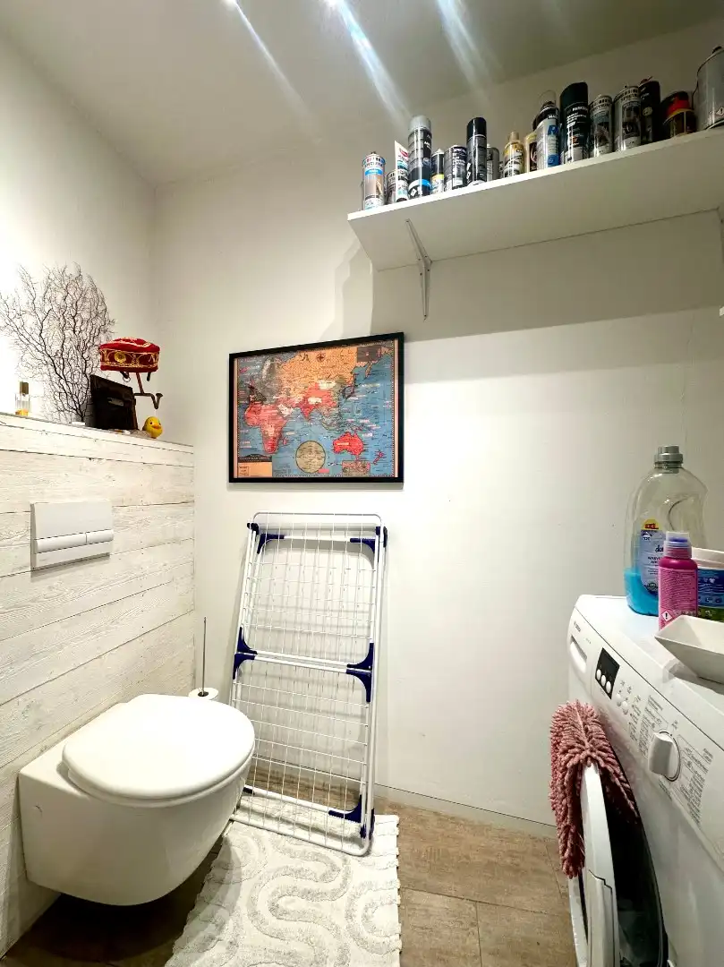 Knusse rijwoning op toplocatie foto 6