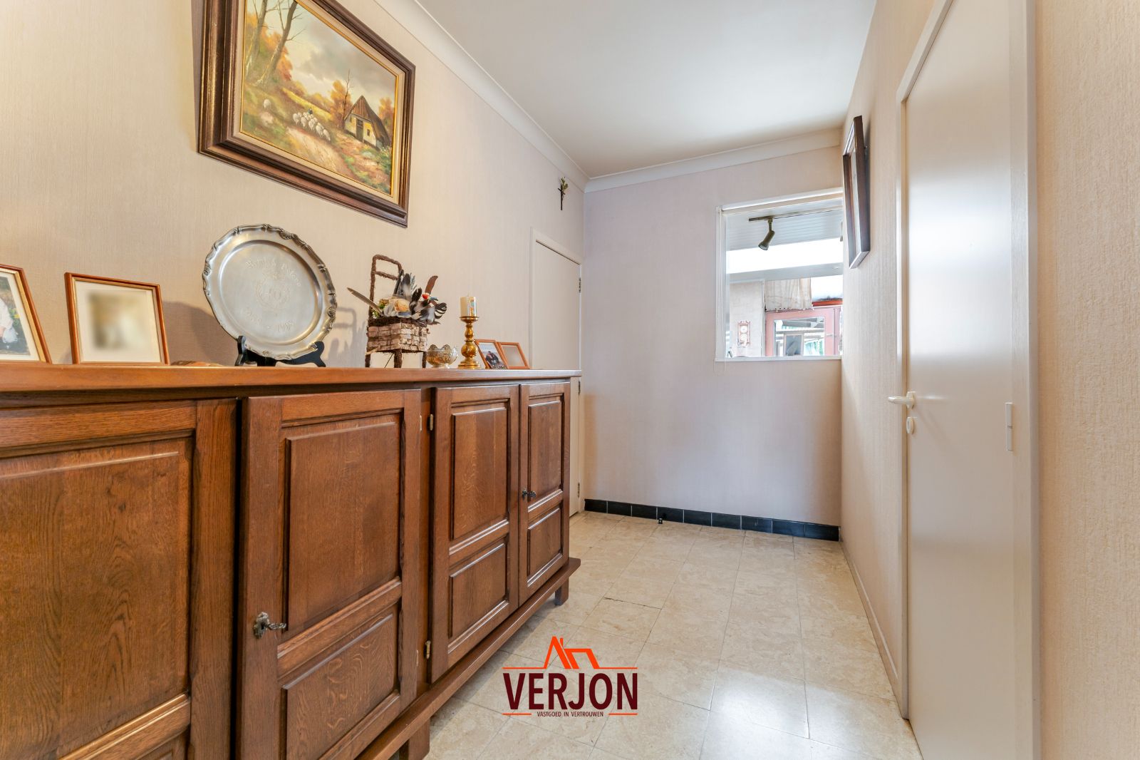 Charmante woning met ruime tuin te koop op het dorpsplein in Kachtem! foto 6