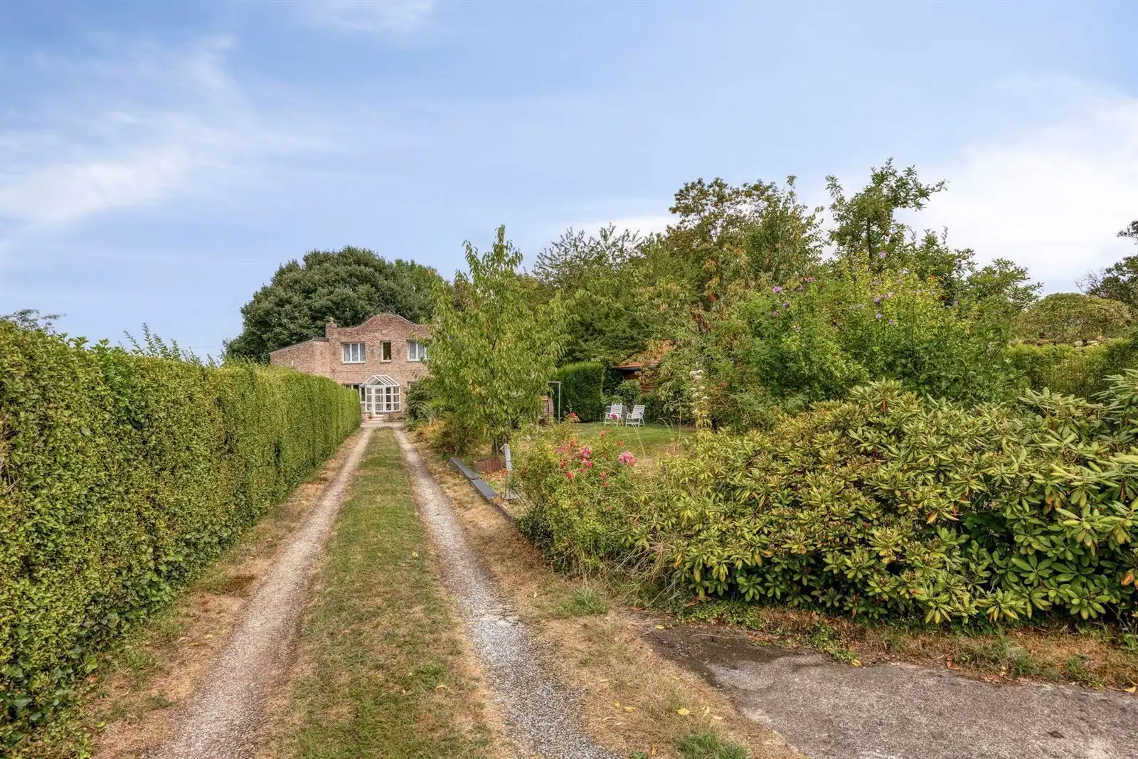 Hoofdfoto van de publicatie: Unieke woning op mooi perceel van 12a