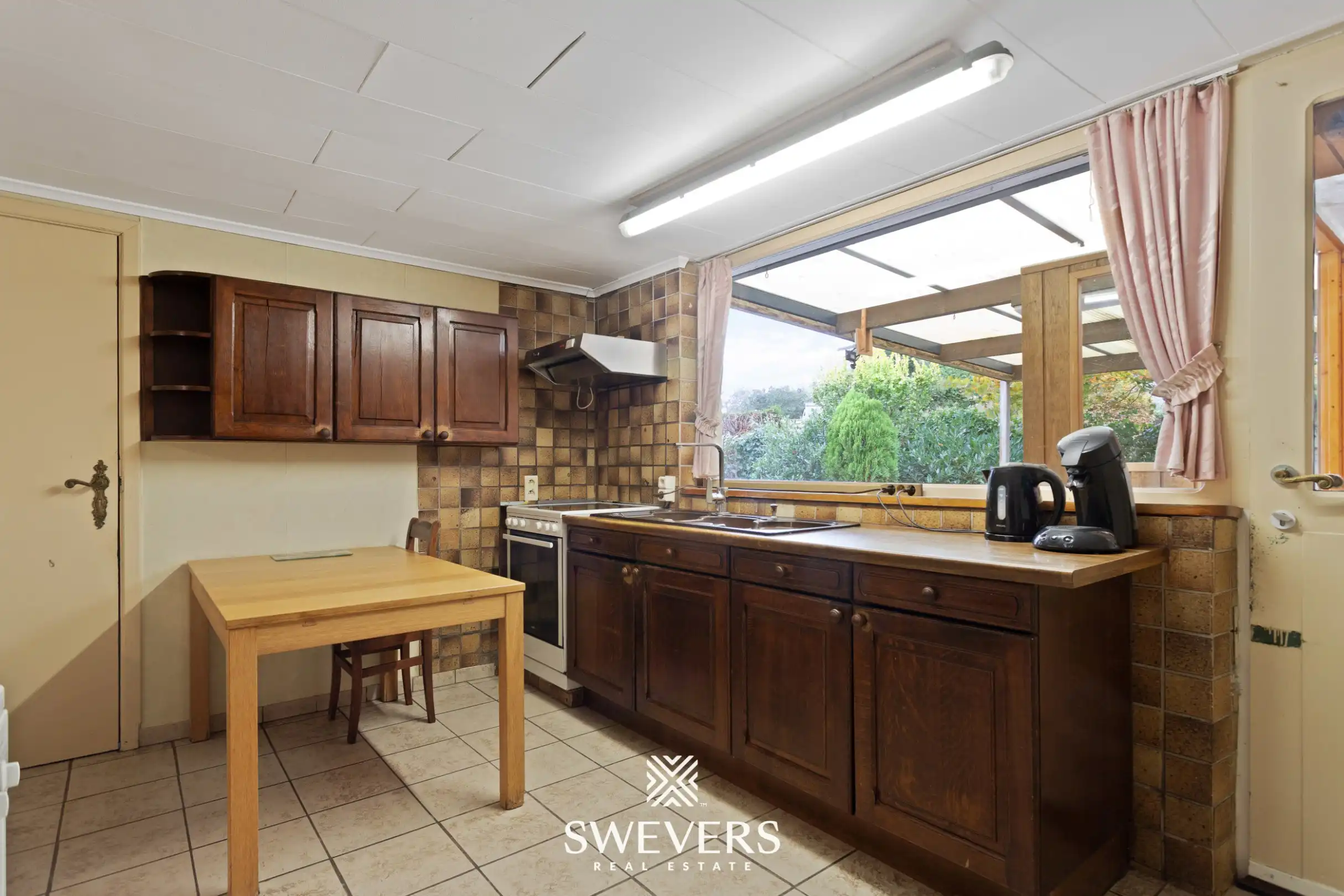 Zeer solide woning met renovatiepotentieel op 10a 18ca  foto 7