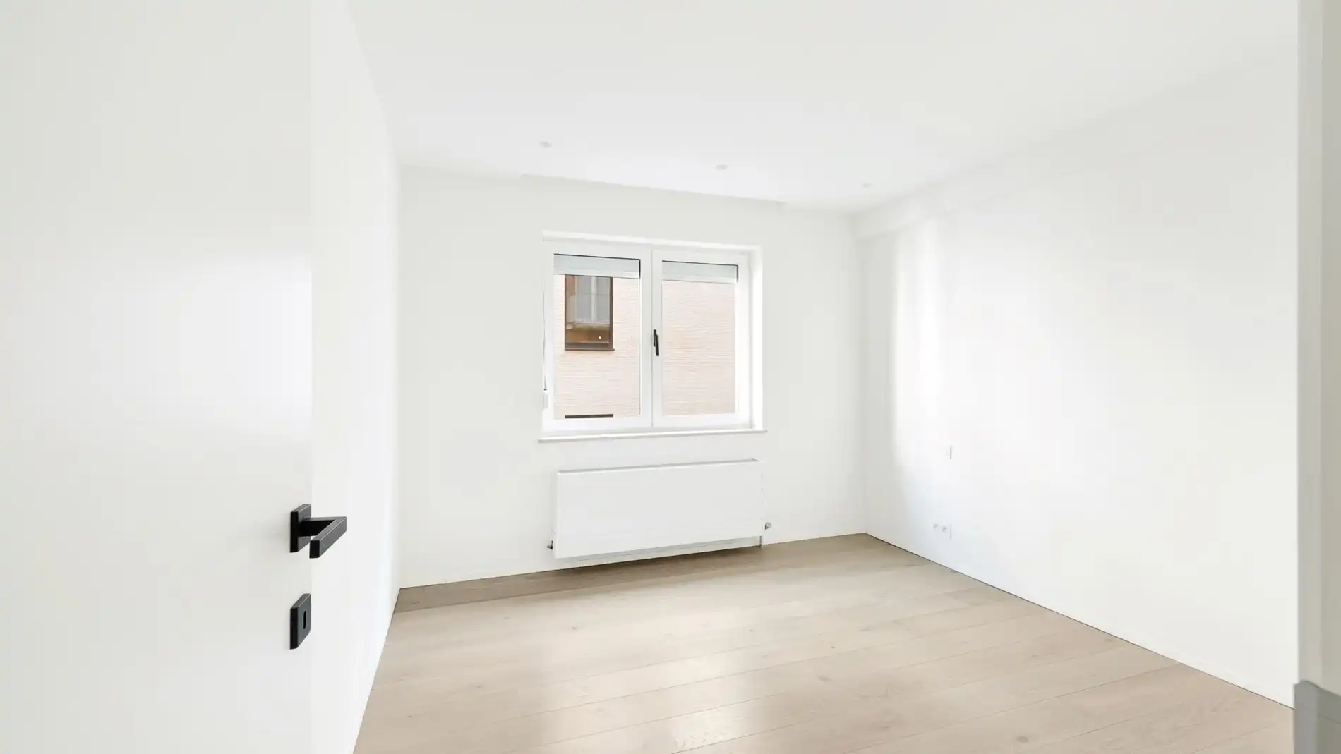 Luxueus gerenoveerd tweeslaapkamerappartement aan de vernieuwde boulevard van Heist foto 9