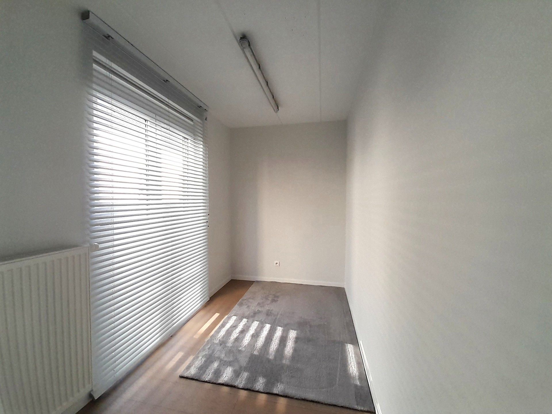 Gezellig 2 slaapkamer-appartementje met autostaanplaats foto 12