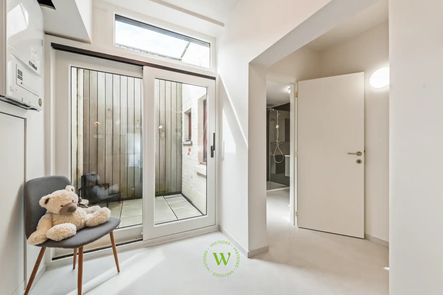 Lichtrijk gelijkvloers appartement met private inkom foto 21
