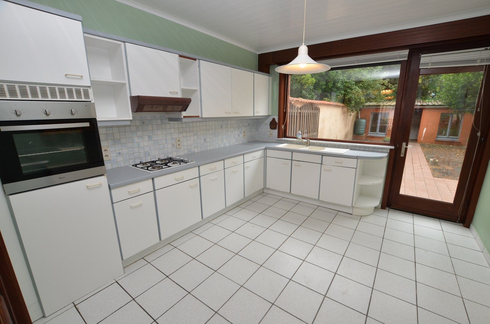 Te renoveren karaktervolle ruime woning met zonnige tuin foto 4