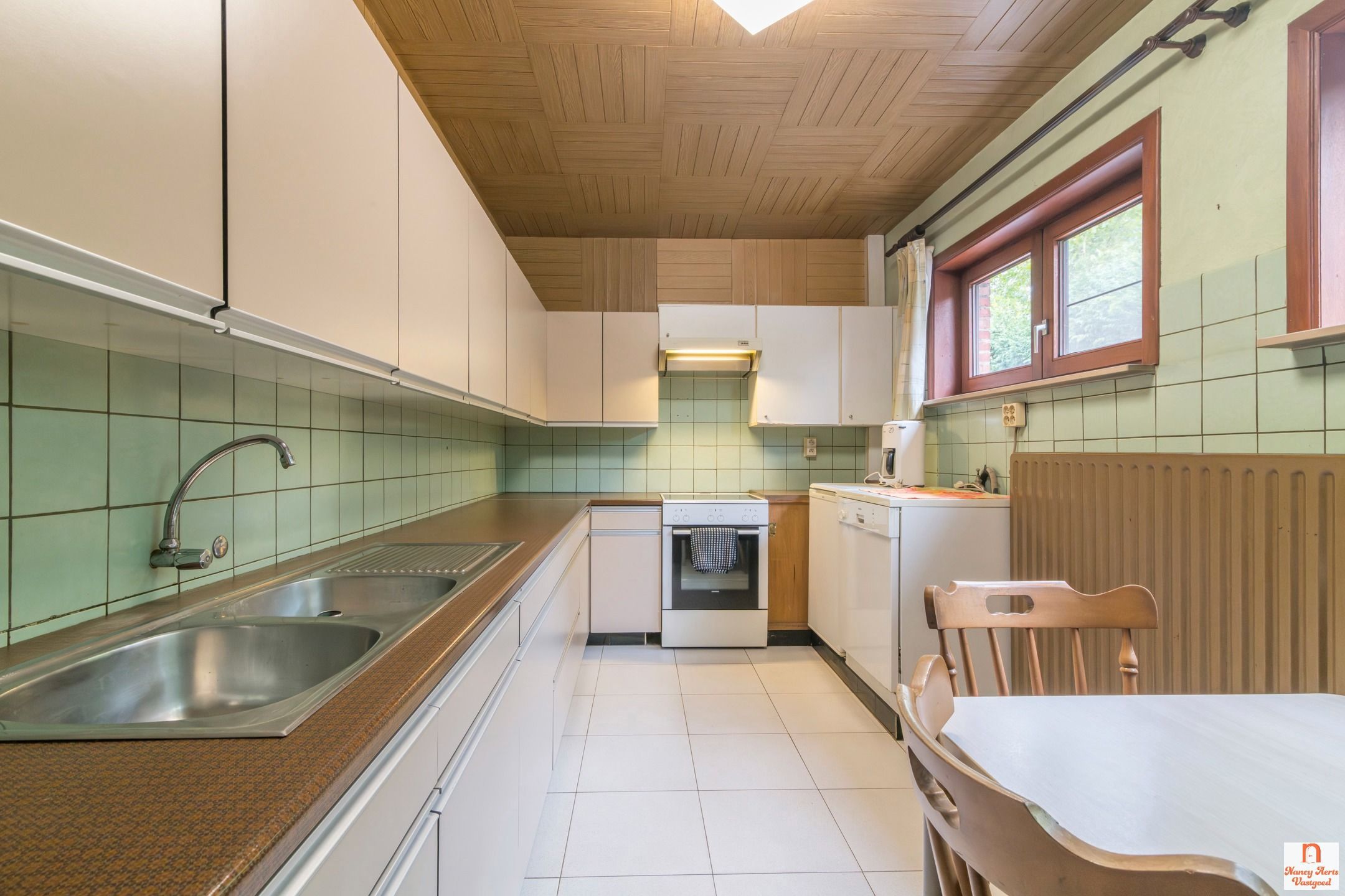 Ruime woning met 4 slaapkamers en uitbreidingsmogelijkheden foto 11