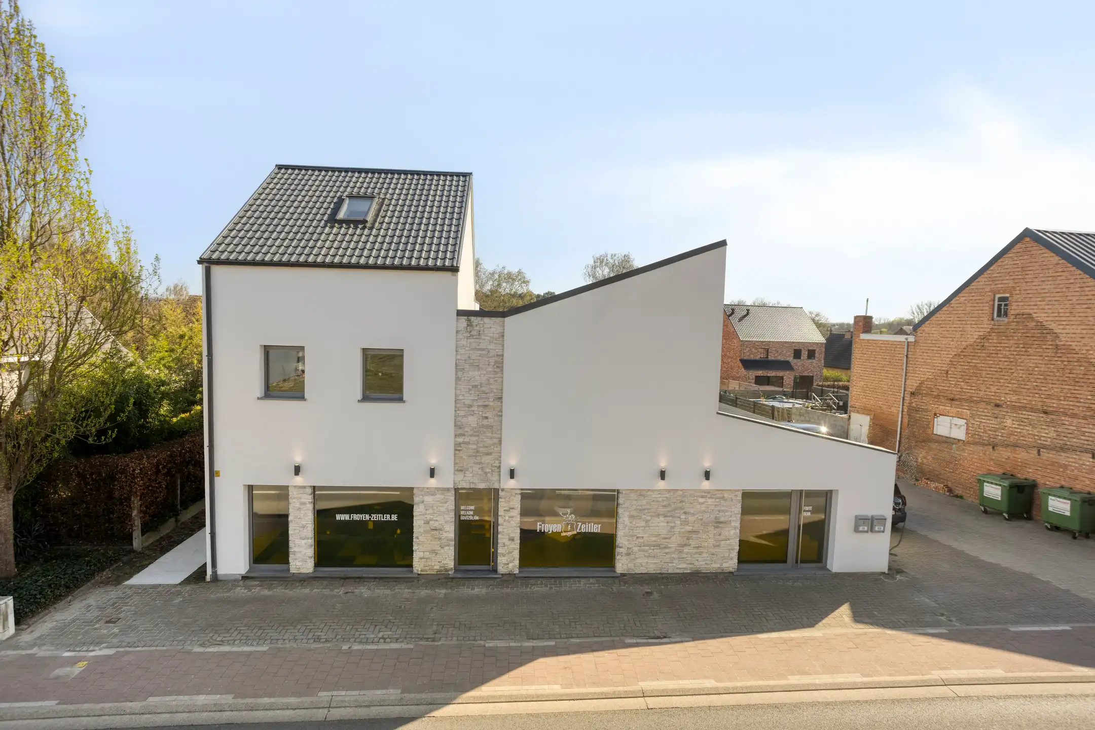 Woonst met handelsruimte op een strategische locatie foto 32