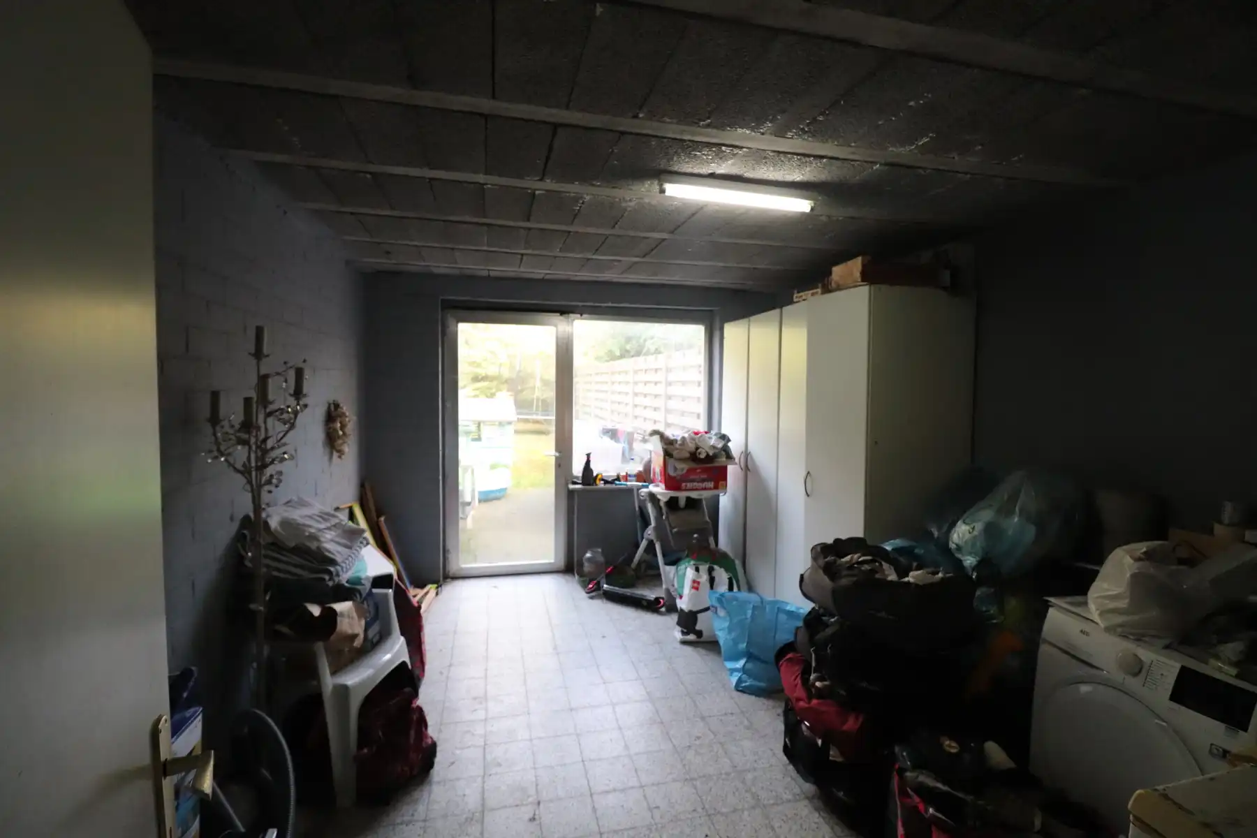 Appartement op de tweede verdieping met 2 slaapkamers met op het gelijkvloers garage met berging en tuin. foto 12