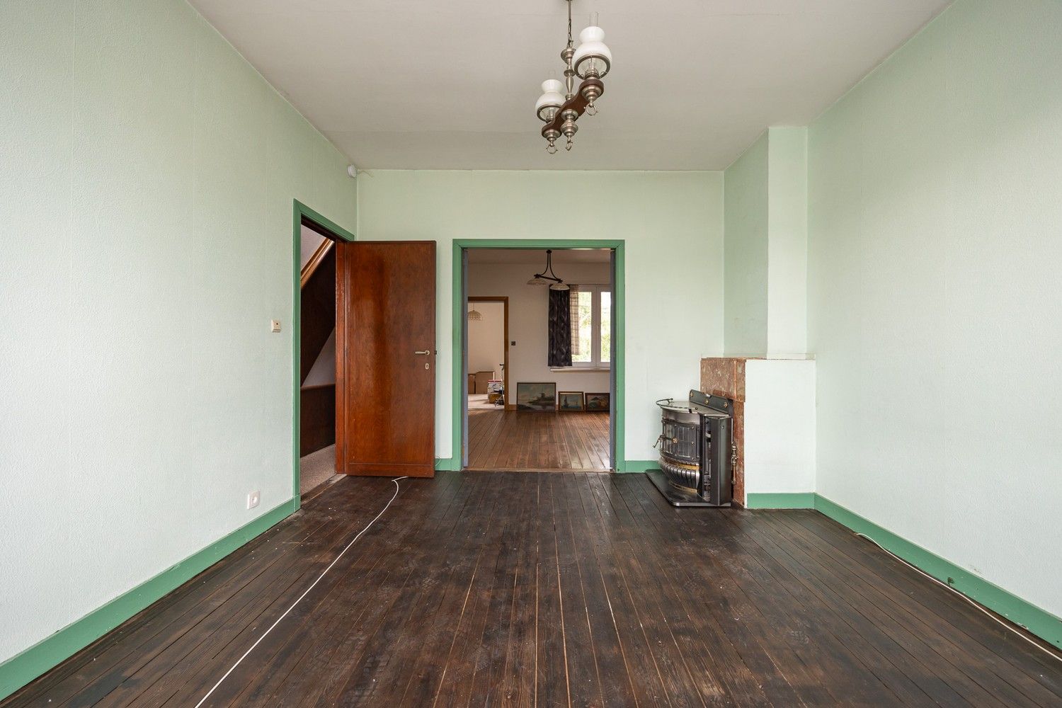 Te renoveren opbrengsteigendom met 3 éénslaapkamerappartementen nabij het Boekenbergpark foto 9