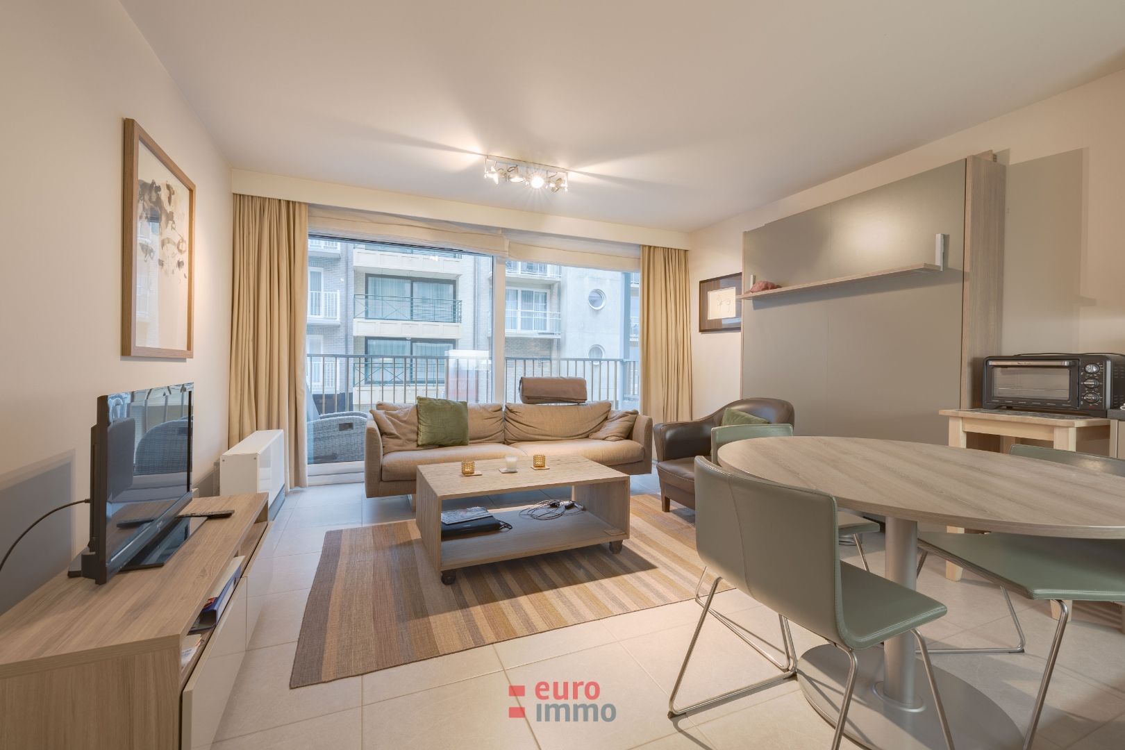 Subliem gelegen appartementje met zijdelings zeezicht! foto {{pictureIndex}}