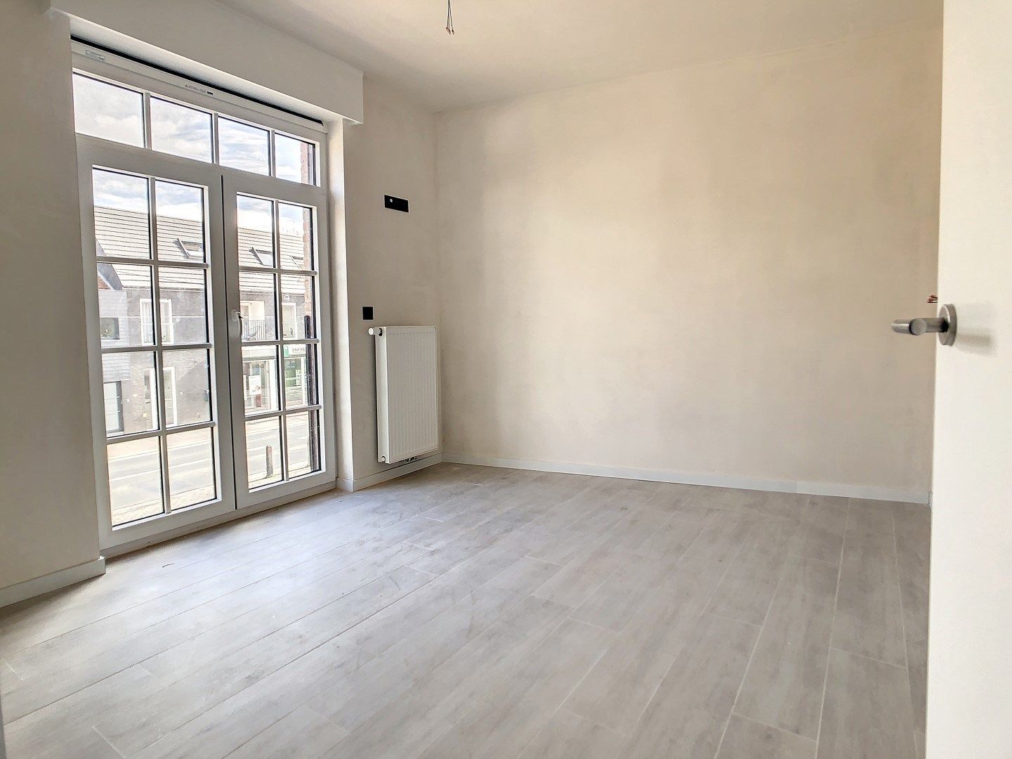 Nieuwbouwappartement met parkeerplaats in centrum Staden foto 4