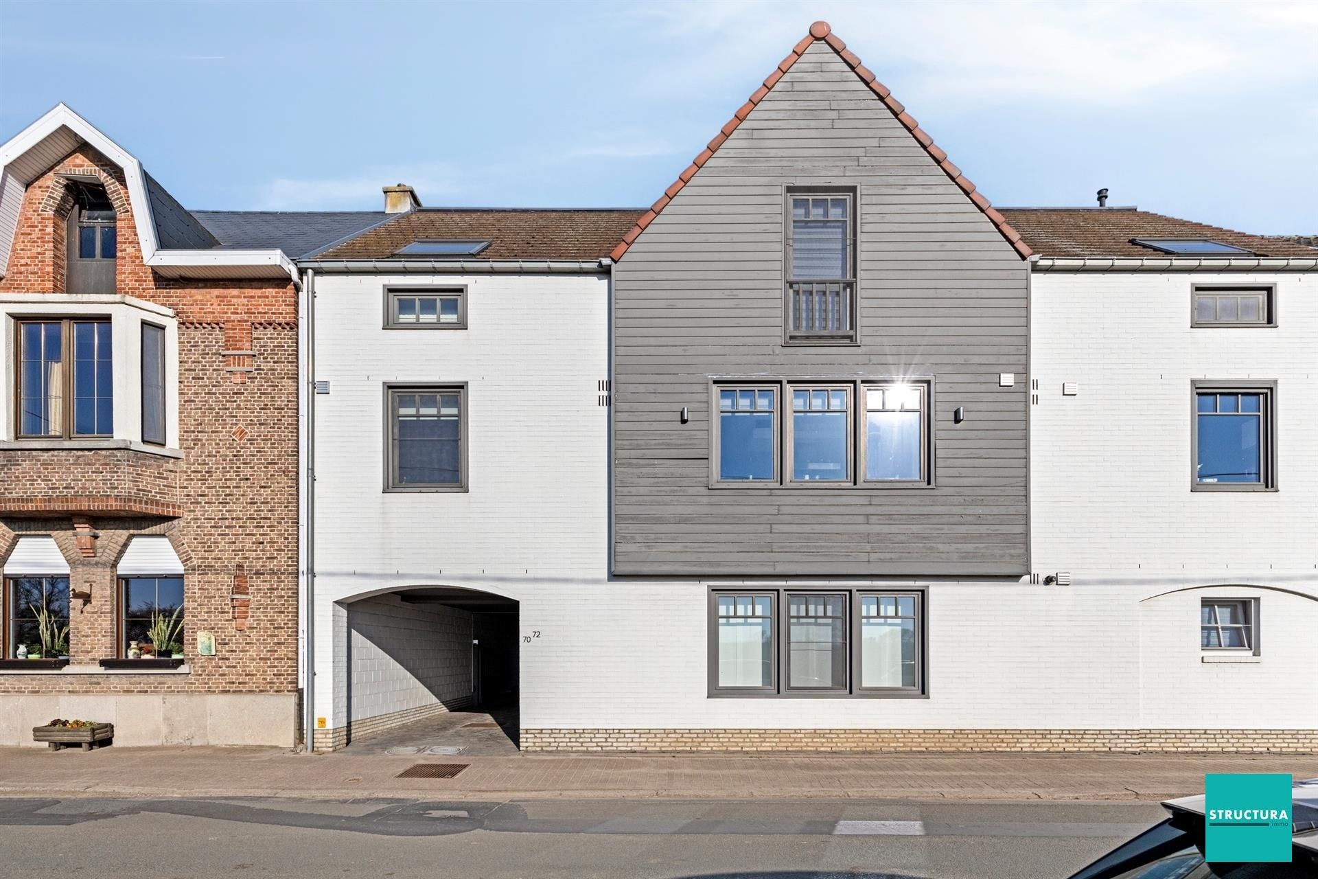 Gelijkvloers appartement met ruime tuin en twee carports foto 18