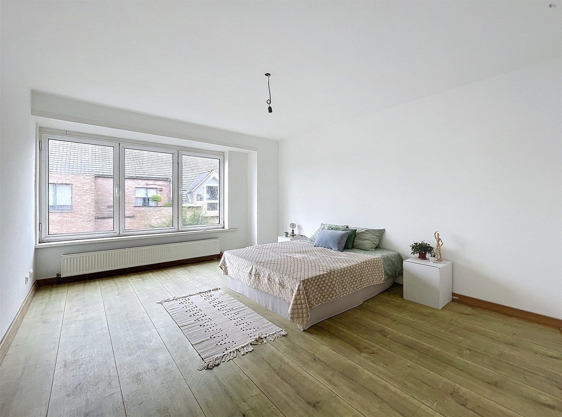 Handelspand met 2 appartementen op perceel van 491 m² NETTORENDEMENT 5% foto 2