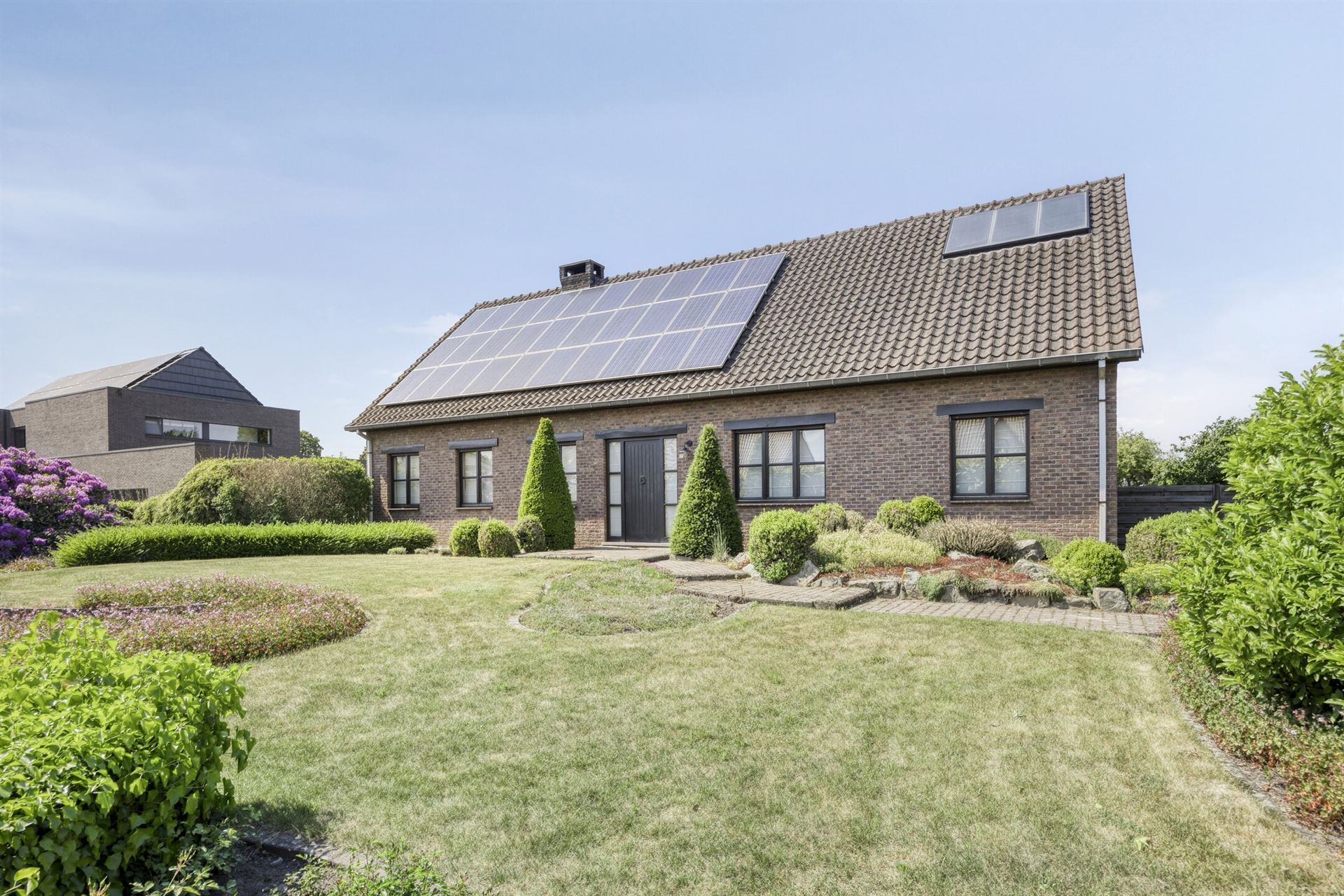 Hoofdfoto van de publicatie: Woning met prachtige tuin te koop in Laakdal