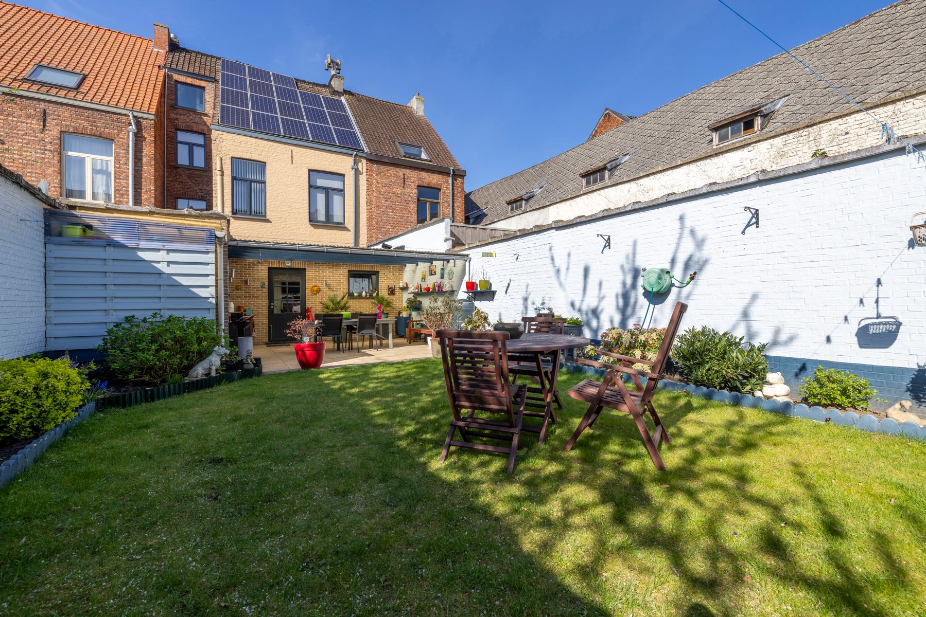 Ruime woning met 5 slpk, garage en zongerichte tuin te koop! foto 24