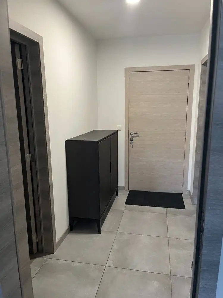 Modern gelijkvloers 1 slaapkamer appartement met ruim terras en ondergrondse parking in As! foto 12