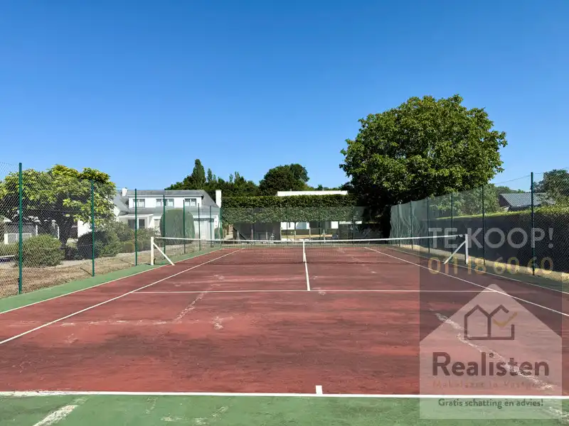 Charmant en ruim huis te koop in Stokrooie - Perfecte gezinswoning met 4 slaapkamers en een tennisplein foto 12