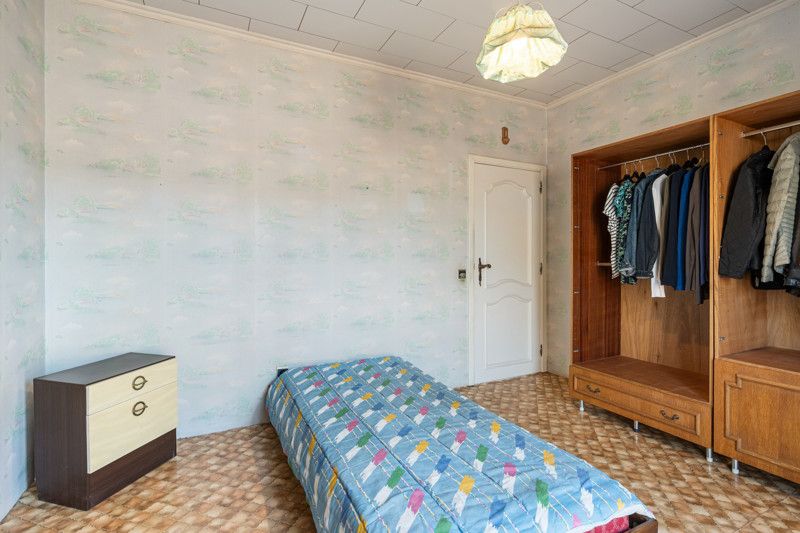 Gelijkvloerse woning met grote loods achteraan op 25are foto 28