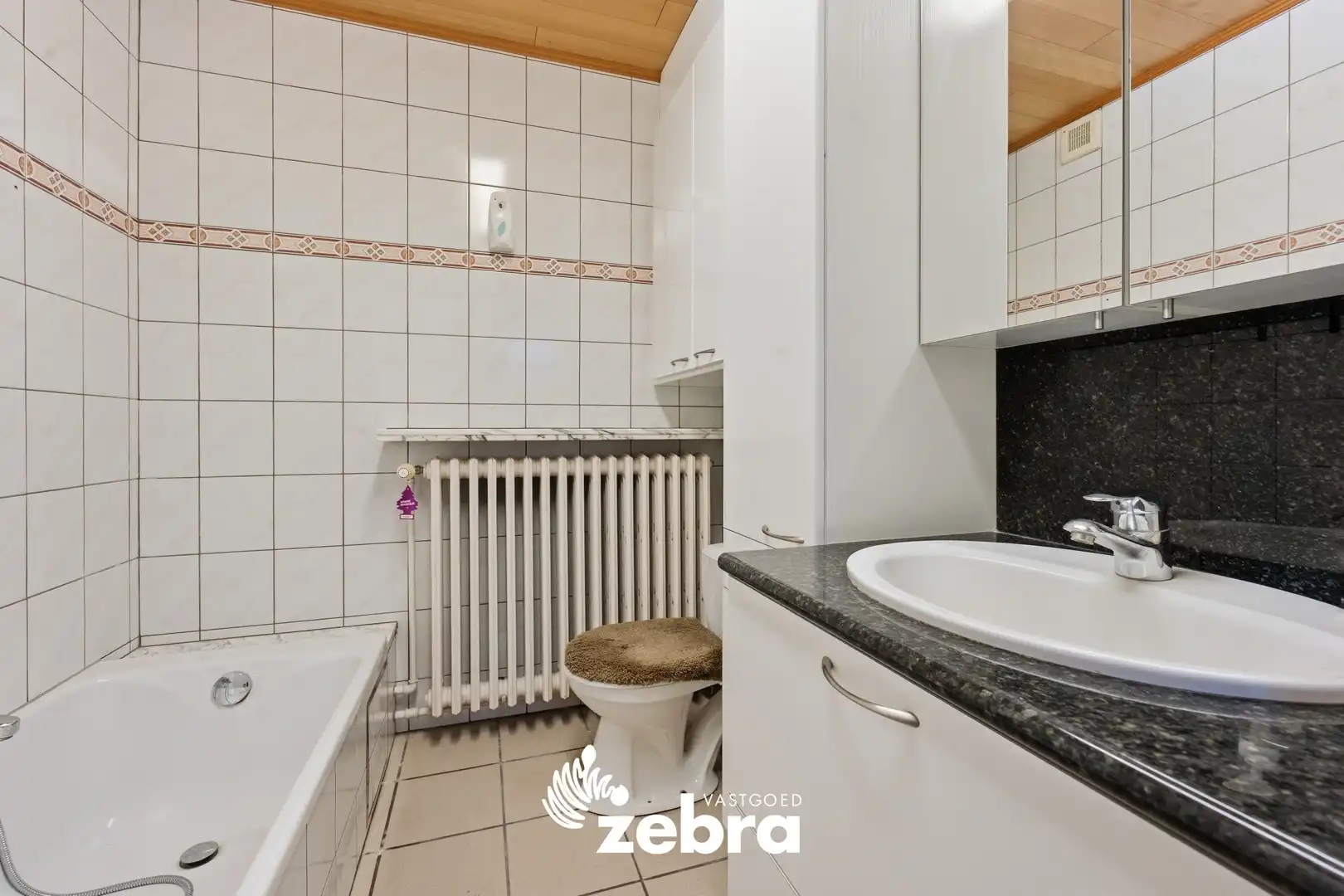 Ruime woning met 4 slaapkamers op een perceel van 601 m² te Meulebeke! foto 9