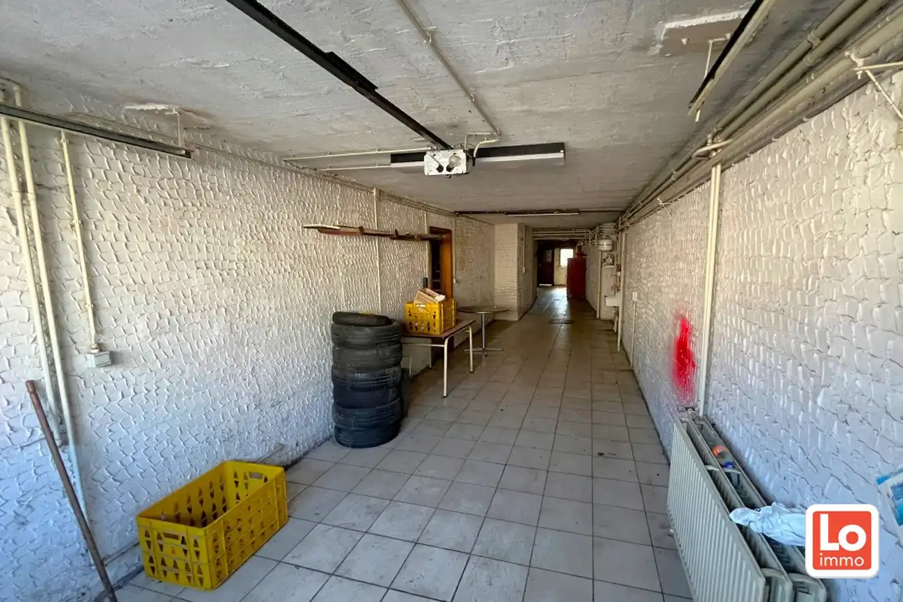 Te renoveren woning met 3 slaapkamer en tuin op een topligging in Centrum Lochristi foto 2