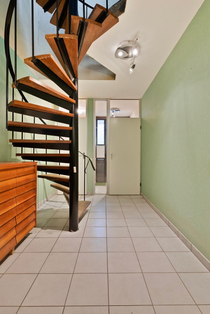 In de wijk 'Langbaanvelden' ligt deze te renoveren bel-étagewoning met 3 tot 4 slks, garage en tuin! foto 6