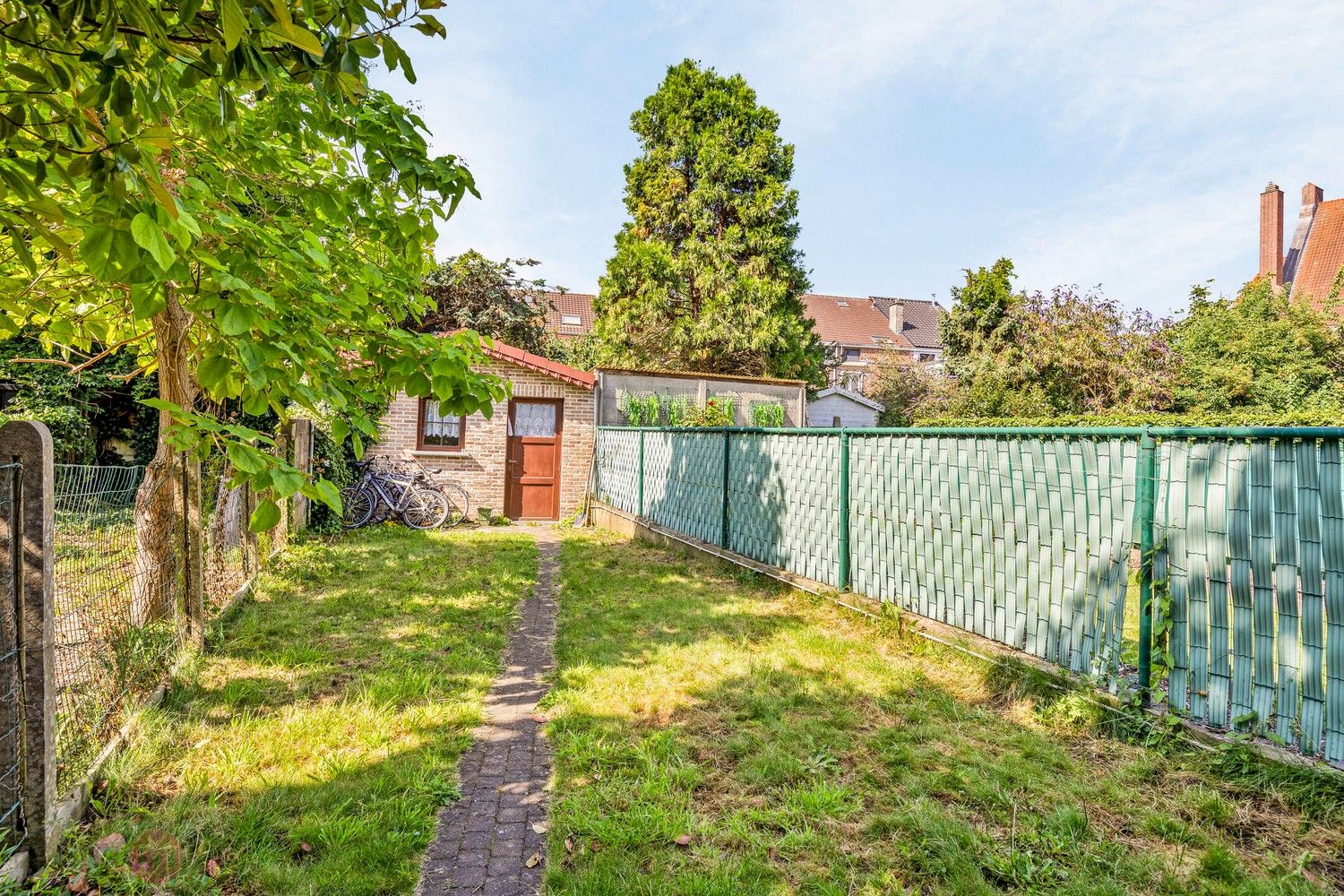 Charmante rijwoning met 3 slaapkamers en leuke tuin. foto 25