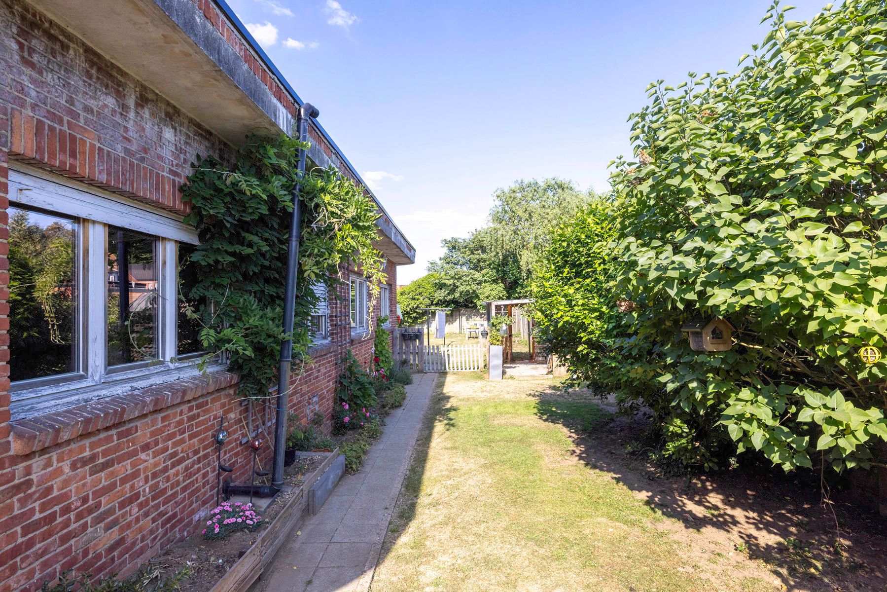 Woning met 2 / 3 slpk, 2 bdk en werkplaats op 580m² foto 24