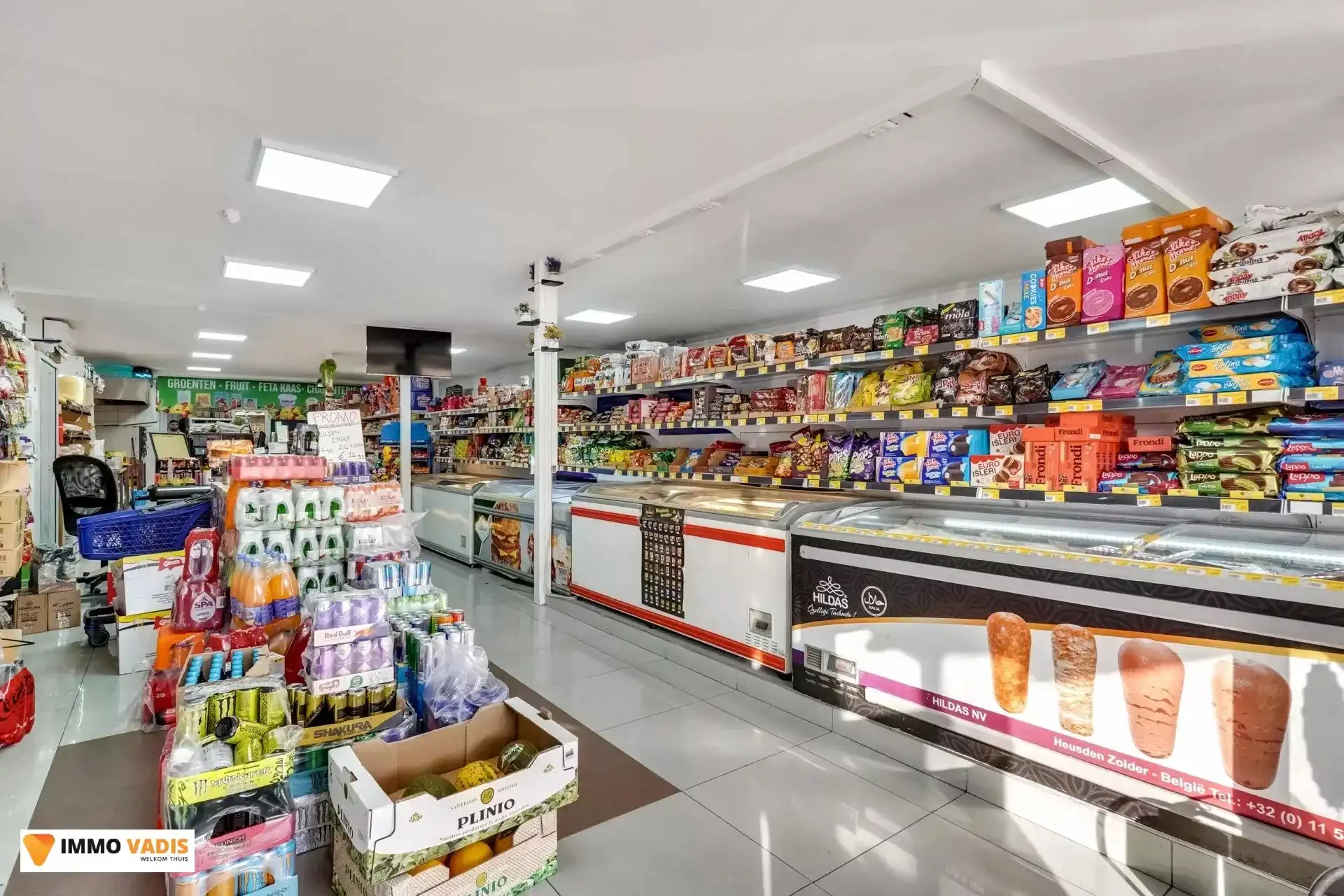 Handelspand met woonst en naastliggende woning foto 4