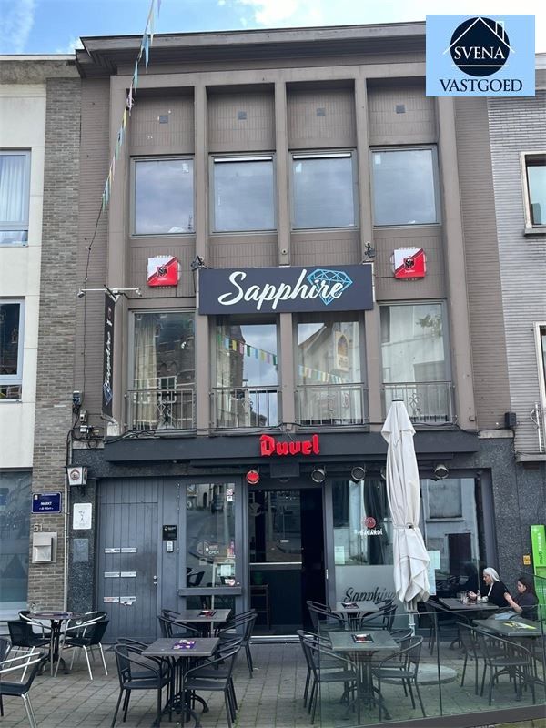 OPBRENGSTEIGENDOM BESTAANDE UIT 1 HANDELSZAAK EN 3 APPARTEMENTEN foto 1