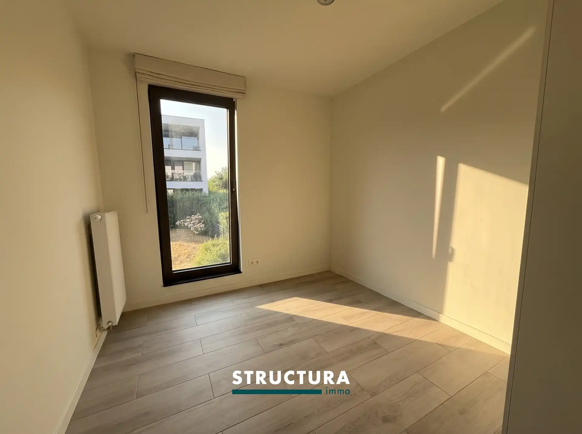 Nieuwbouwappartement met staanplaats en kelder foto 9