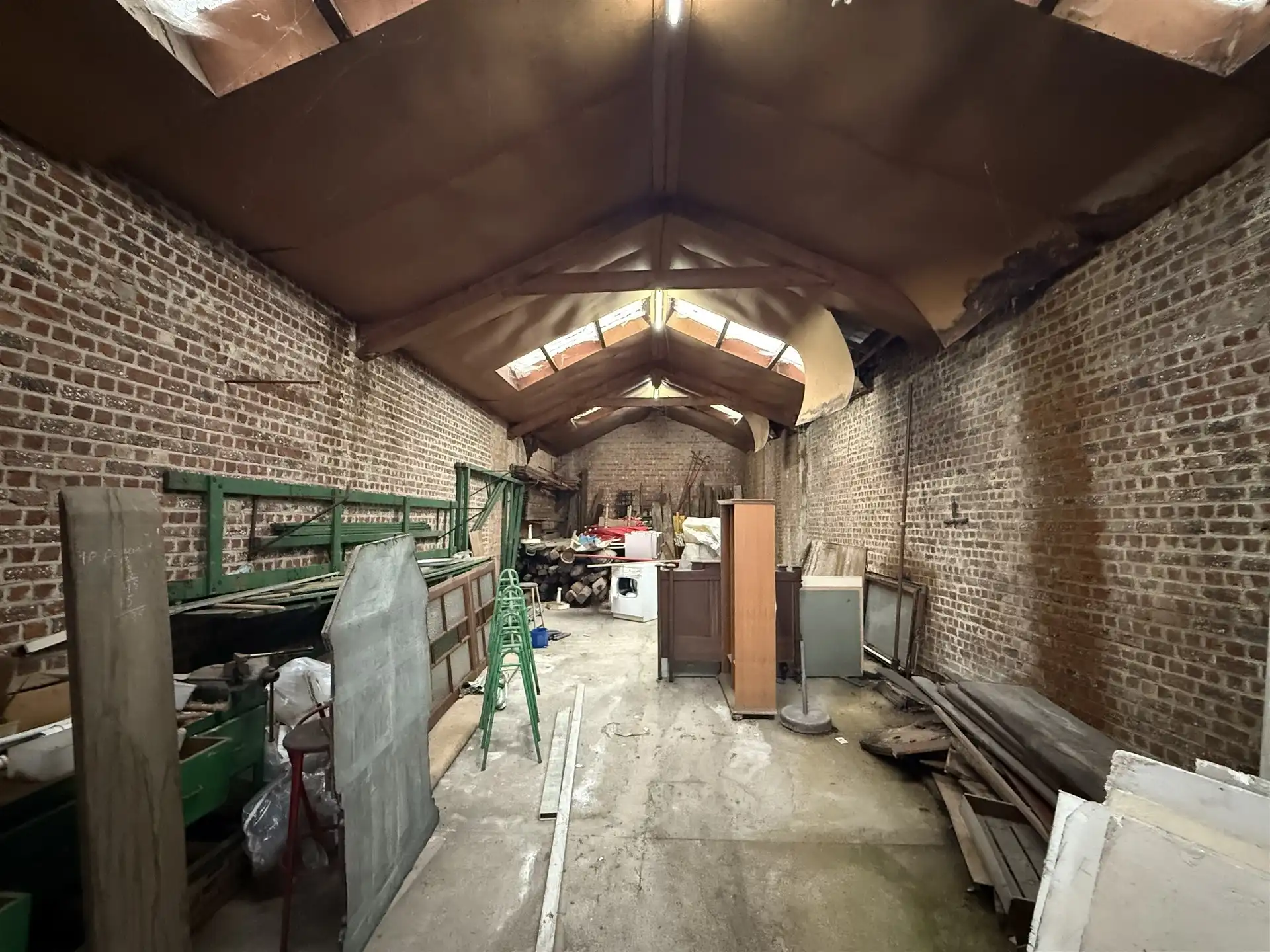 Ruime bergplaats met ontwikkelingspotentieel in het centrum van Merchtem foto 3