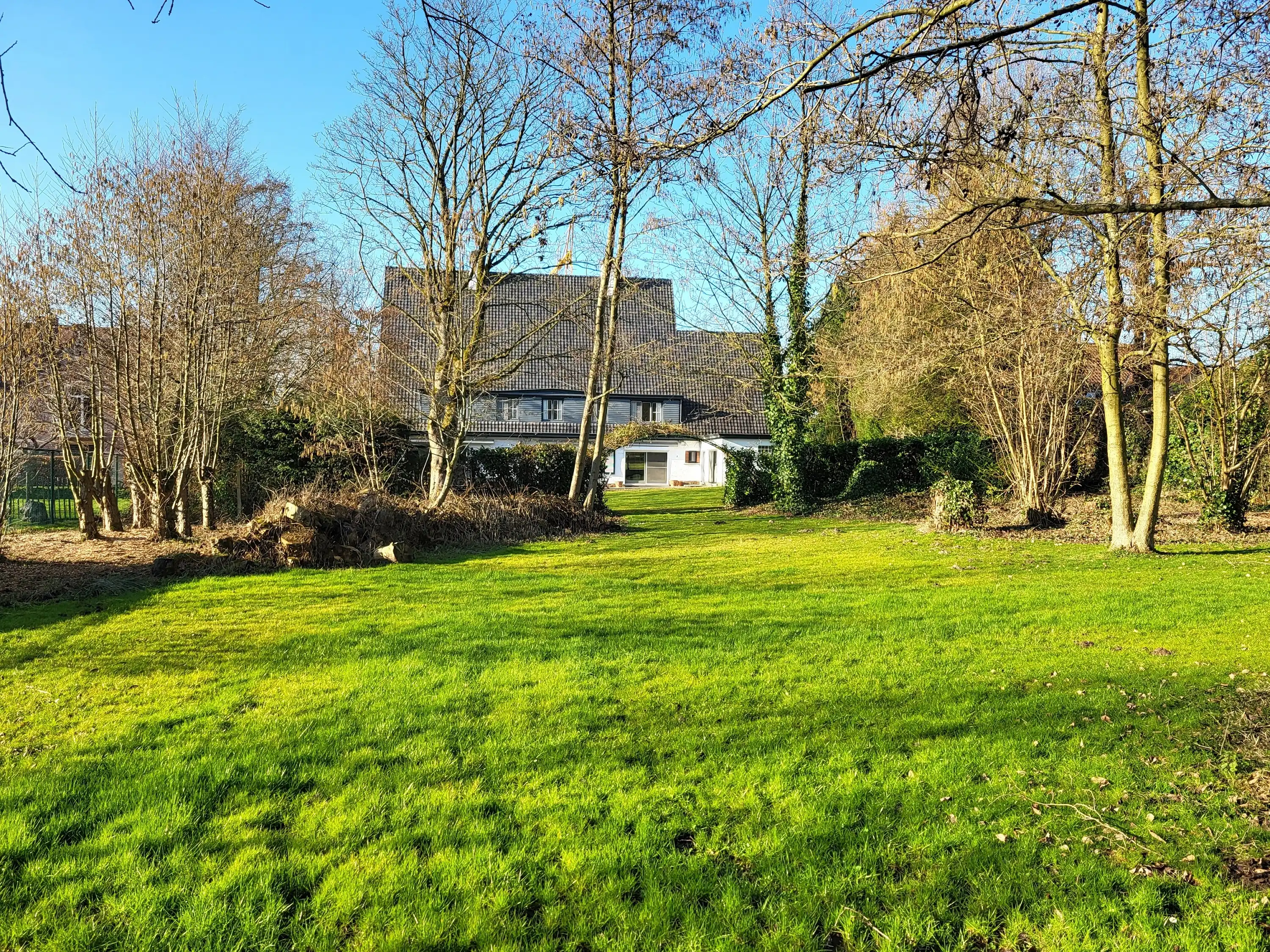 Uniek landhuis op een terrein van 3870m² met aangelegde zuidgerichte tuin en garage!  foto 30