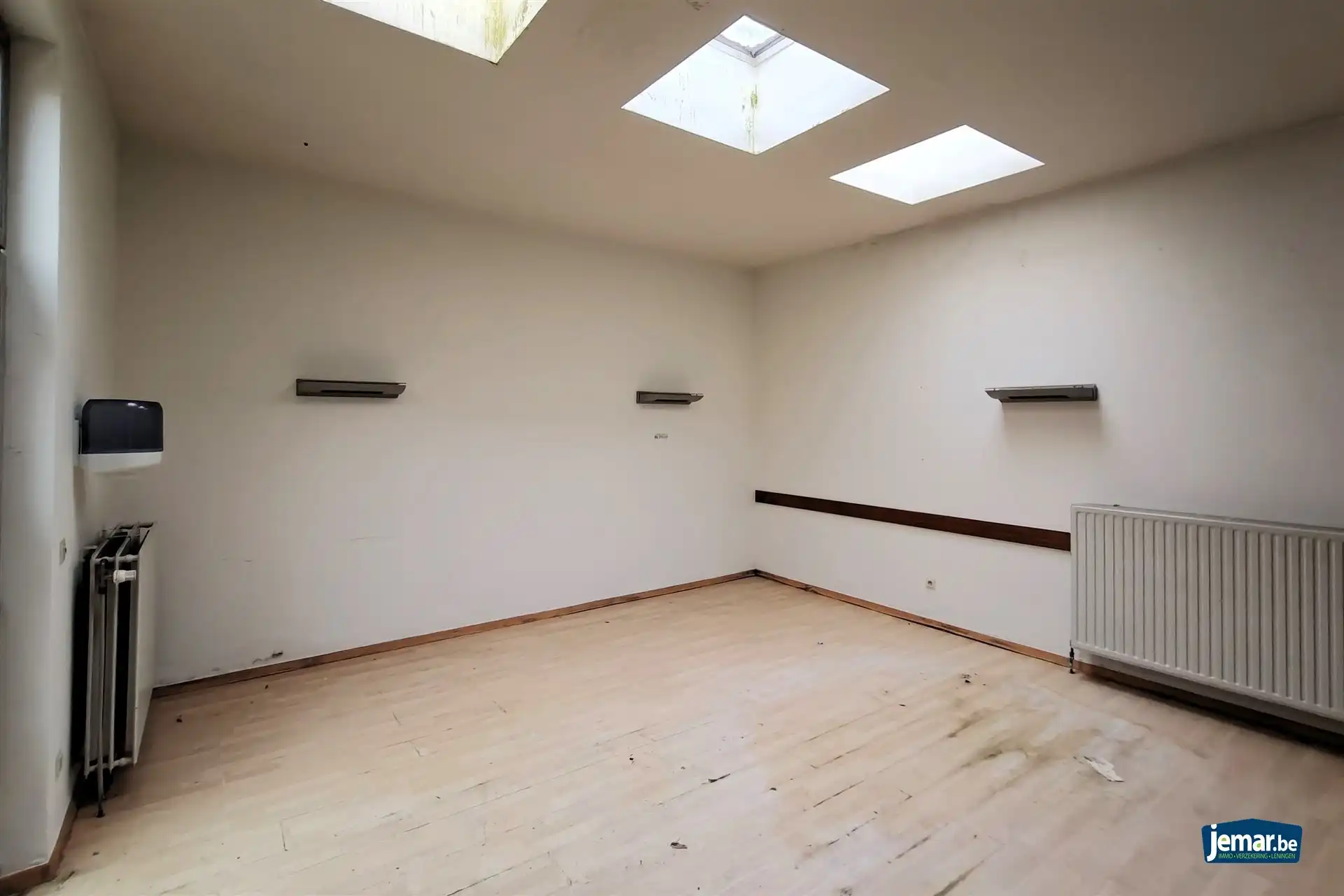 Te renoveren kantoorgebouw (311m²) in het historisch centrum van Borgloon foto 8