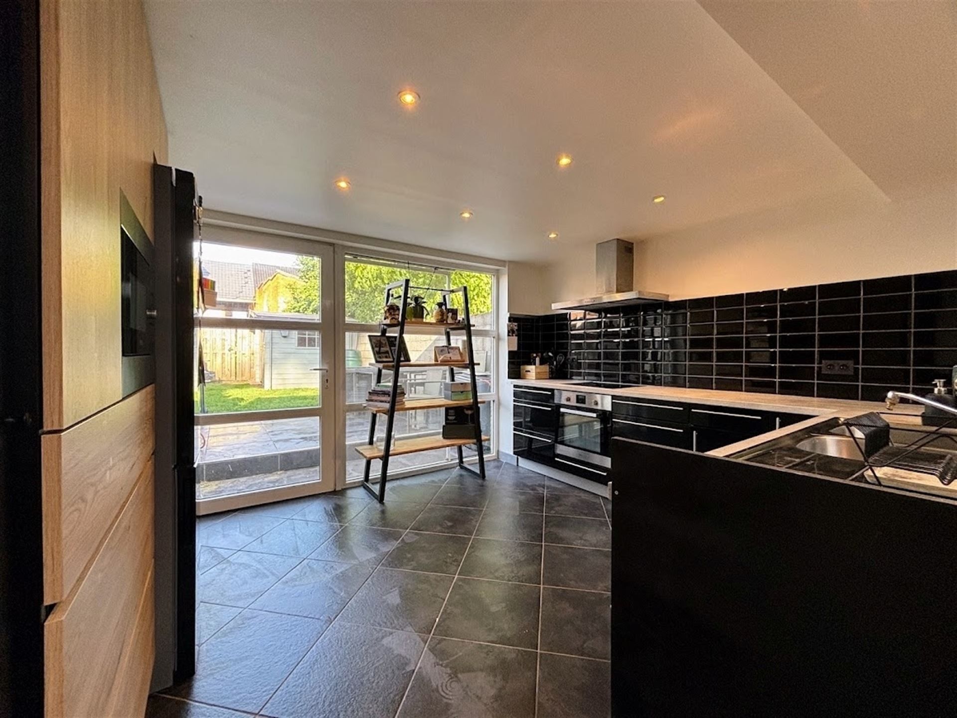 Gezellige woning met tuin en garage! foto 8