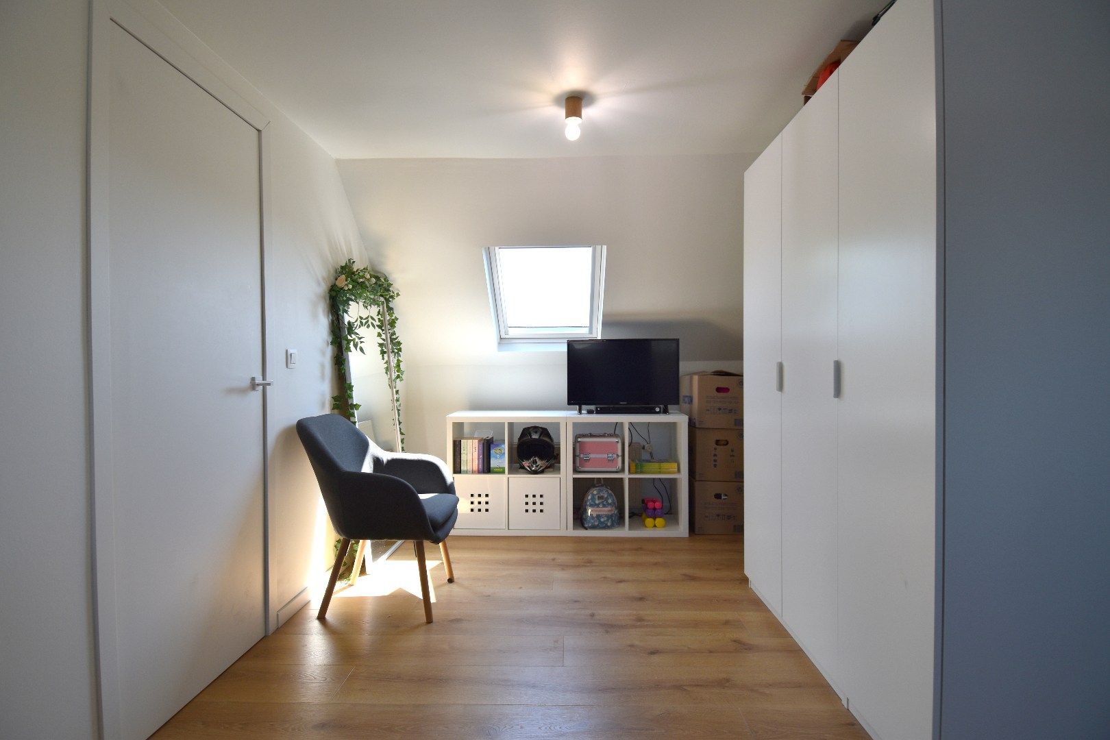 Hippe instapklare rijwoning met 3 slaapkamers en zonnige tuin te koop in Aalbeke foto 15