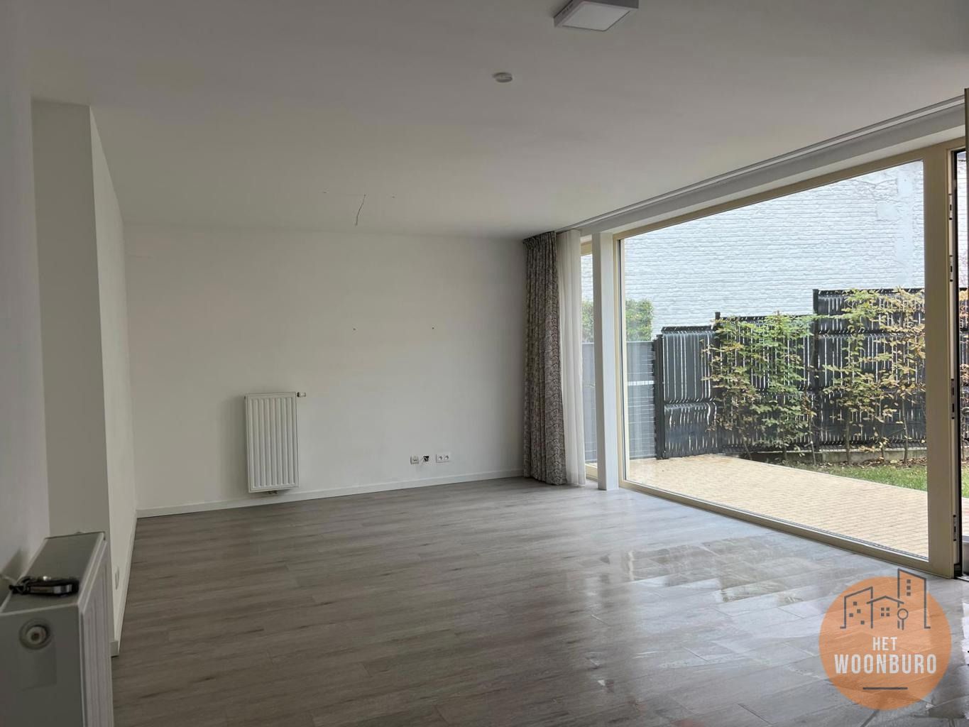 Gelijkvloersappartement met tuin, kelder en parkeerplaats foto 5