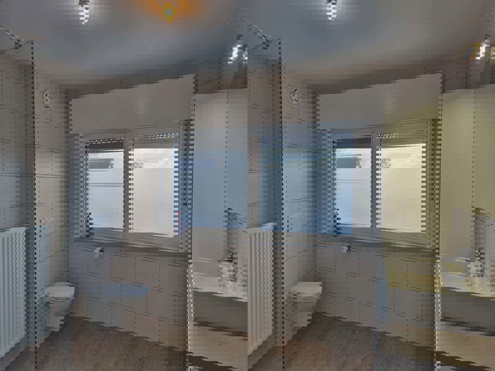 Halfopen bebouwing met ruime tuin en garage - IMPE foto 13