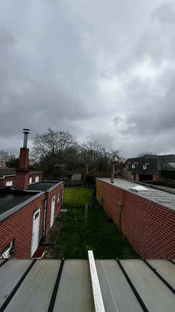 Grote woning met mogelijks vier kamers, garage en ruime tuin foto 18