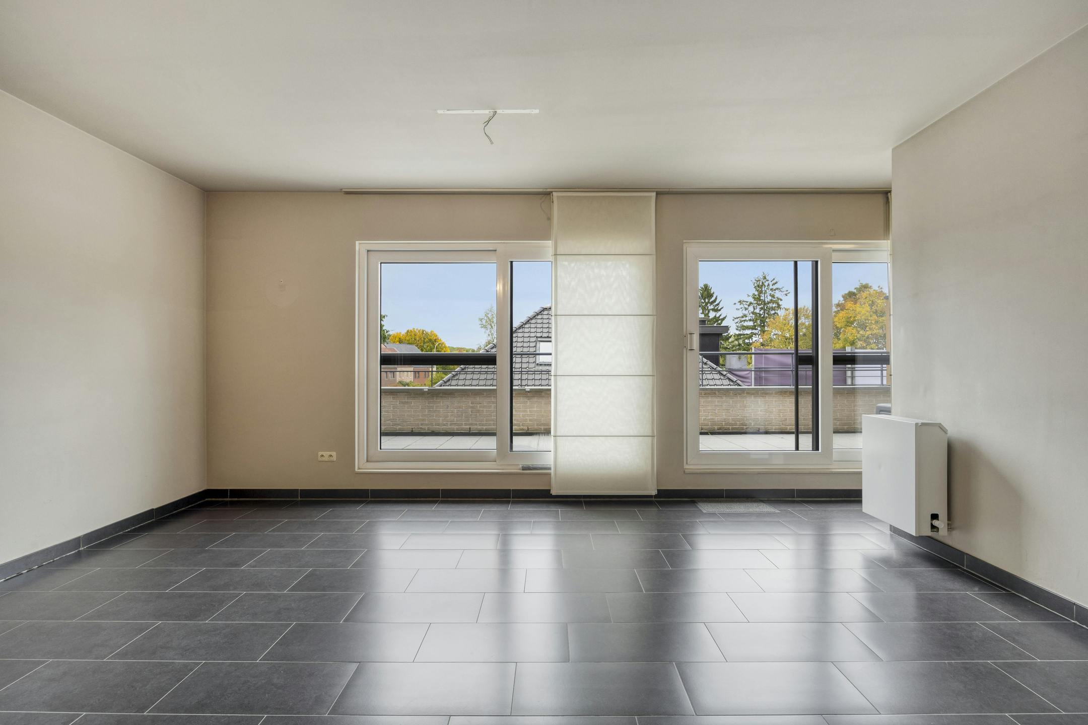 Instapklaar appartement met staanplaats en groot terras nabij centrum Diepenbeek foto 3