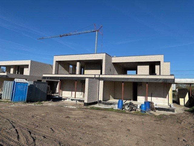 HOOGWAARDIG AFGEWERKT GELIJKVLOERS APPARTEMENT VAN 124 M² MET 2 SLAAPKAMERS, RUIM TERRAS EN CARPORT TE CENTRUM TUILT foto 6