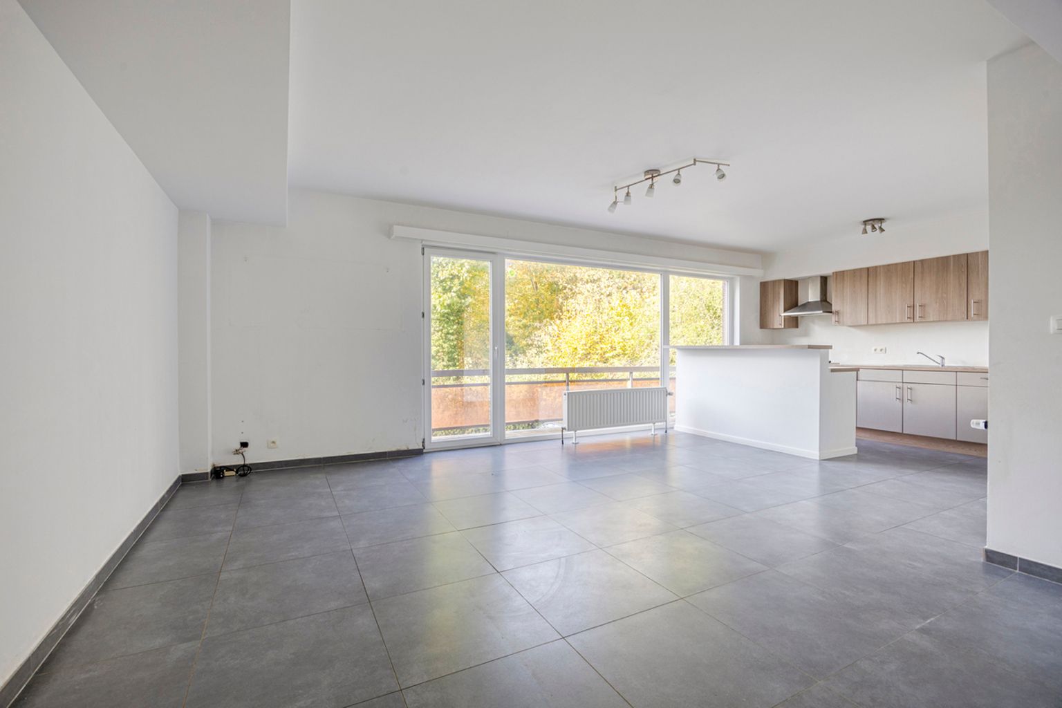 Instapklaar gelijkvloers appartement met eigen tuin foto 5