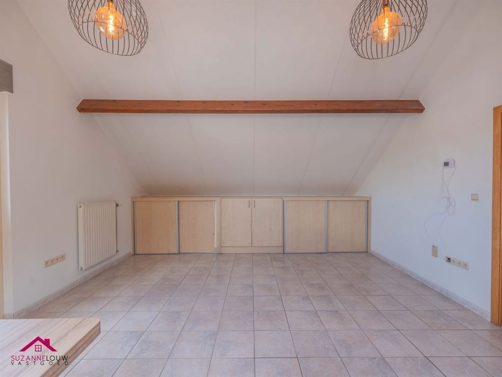 Stijlvol gerenoveerde verrassend ruime vrijstaande woning foto 40