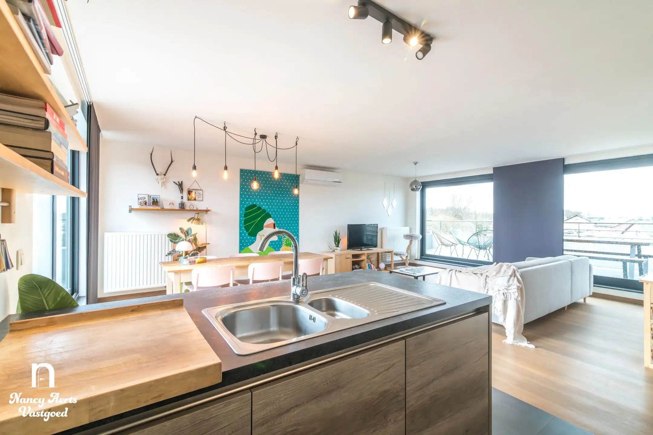 Lichtrijk penthouse met groot rondom terras en 2 parkings foto 6