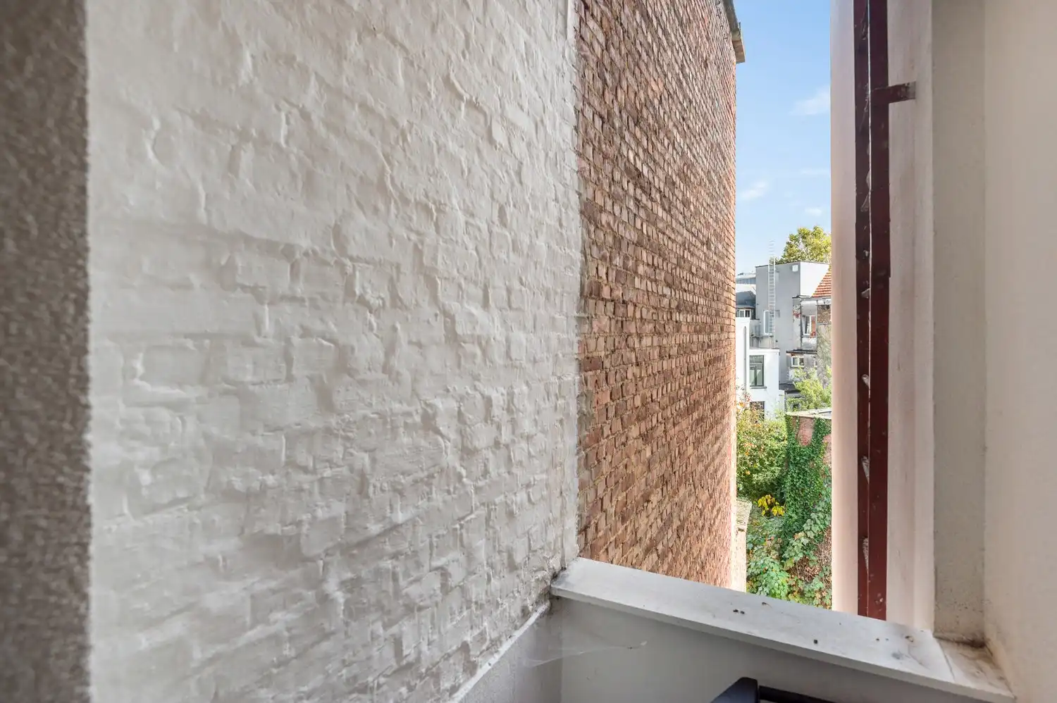 Licht en ruimte in het hart van Antwerpen – 1 slaapkamer appartement foto 12