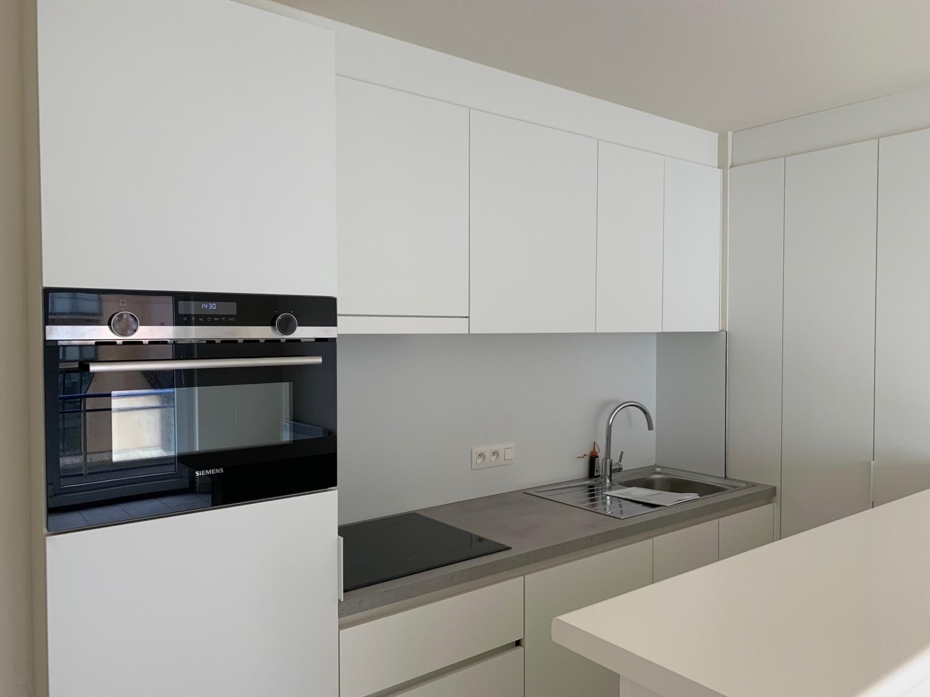 Prachtig gerenoveerd duplexappartement, met zicht op zee foto 3