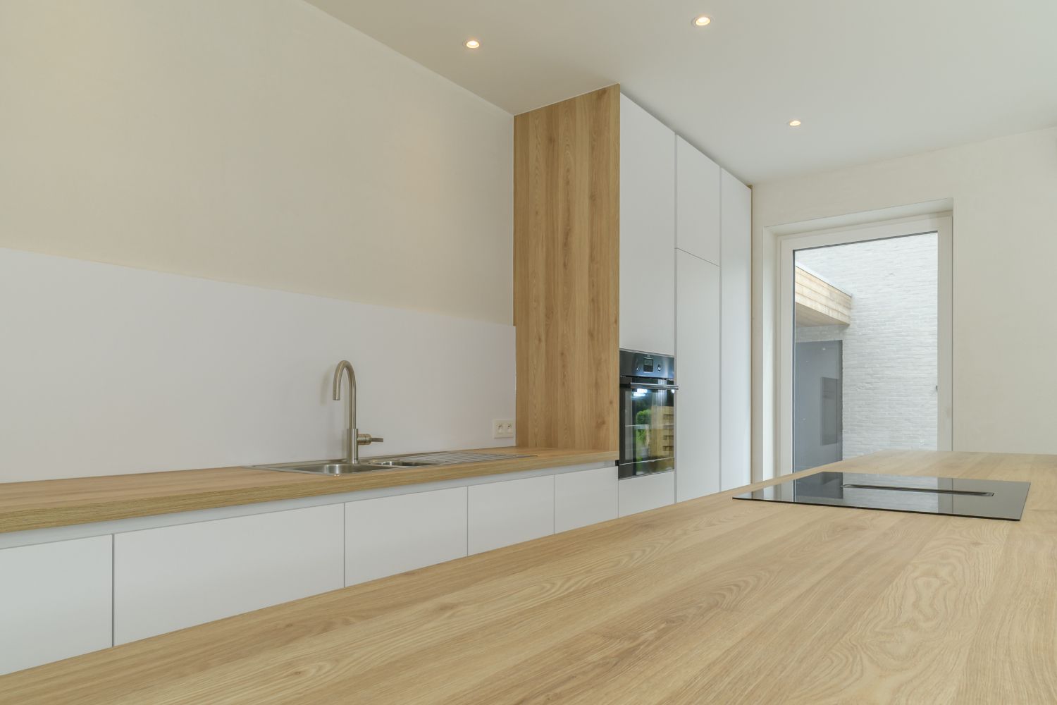 KOKSIJDE: Energiezuinige en kwalitatief afgewerkte nieuwbouwwoning met 3 slaapkamers, carport en gezellig tuintje op 317m² grondopp. foto 10